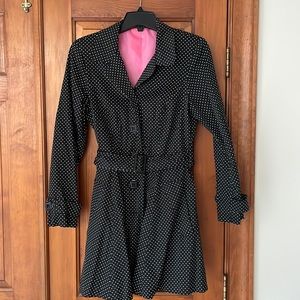 Women’s polka dot belted trench coat.